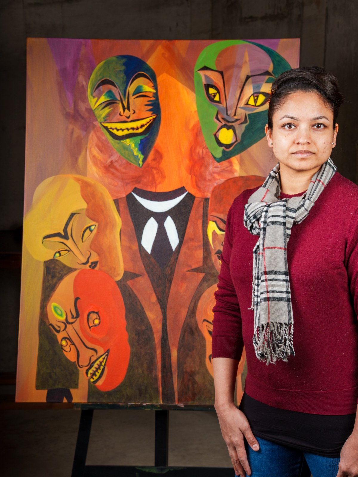 Payal Agarwal beside The Repertoire on the easel, studio in raw concrete. The Repertoire, 2026, by Payal Agarwal.